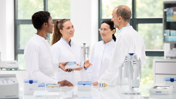 people_lab_scene_scientists_group_discussion_four_scientists_talk