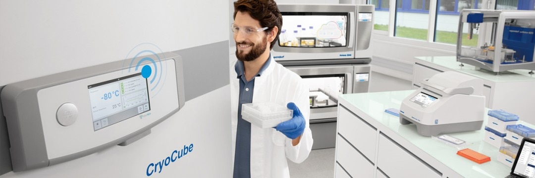 Man opening a smart freezer by Eppendorf.