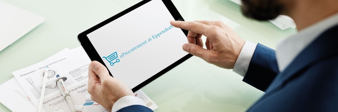 Customer holds a tablet and uses eProcurement solutions to purchase lab products by Eppendorf