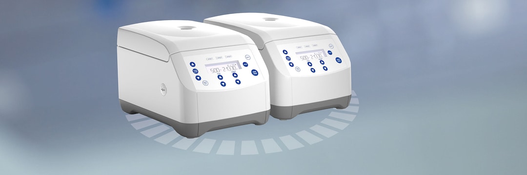 Two centrifuges for IVD context with abstract background